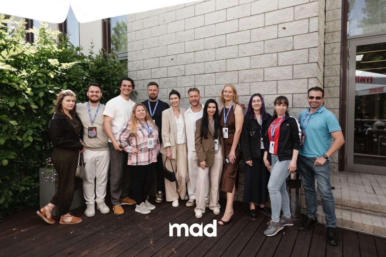 Michael Rosenfeld mit seinem Team bei der MAD Conference